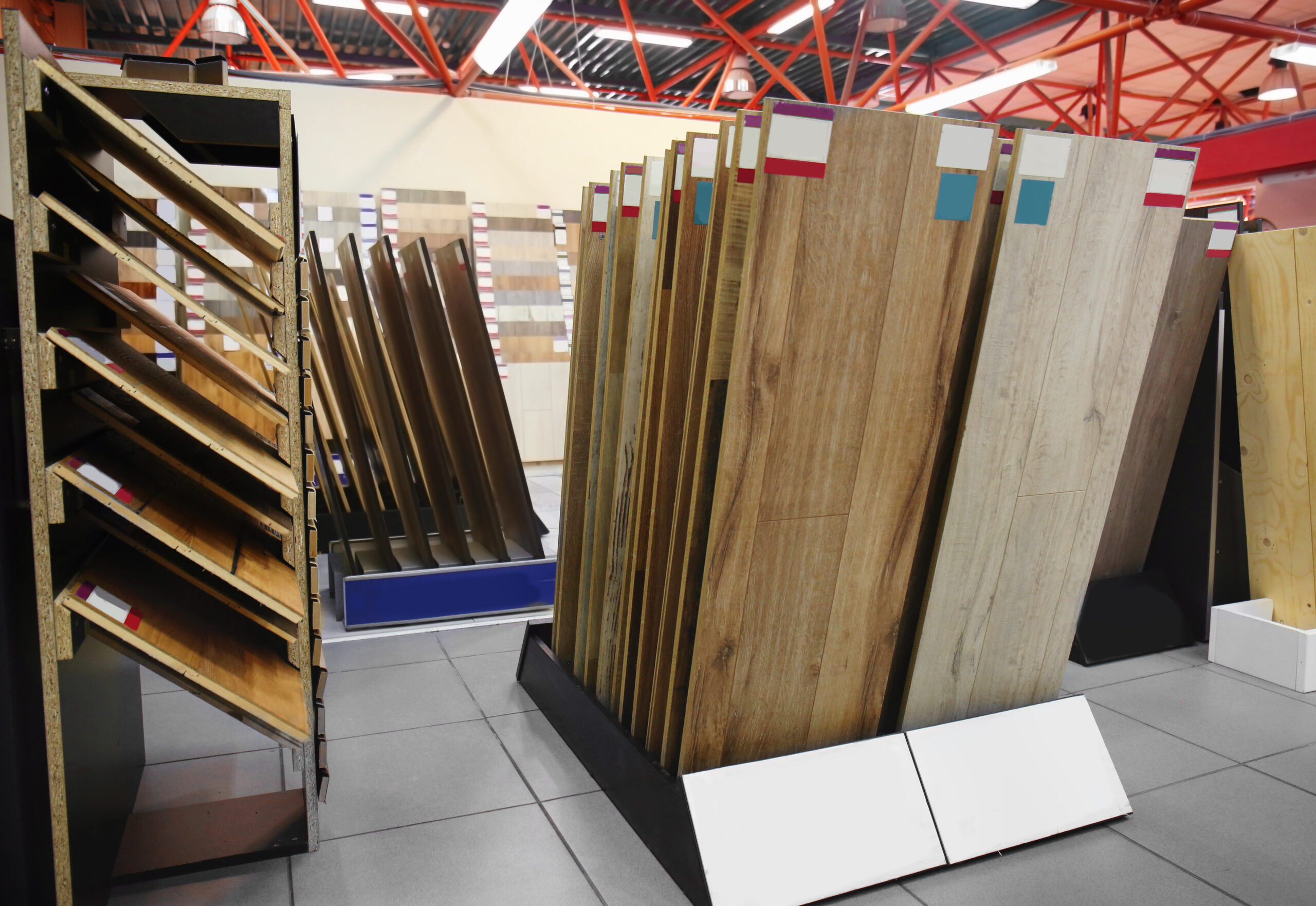 Assortment of laminated flooring samples in hardware store